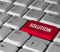 Red solution button on a keyboard illustrates a goal in IT project management